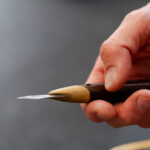 kleines Messer mit einem Holzgriff